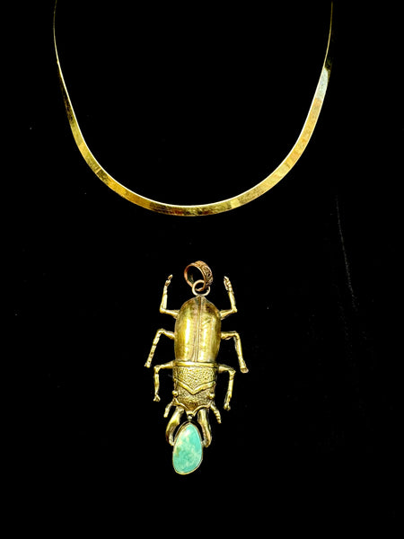Stag Beetle Holding a turquoise stone Necklace