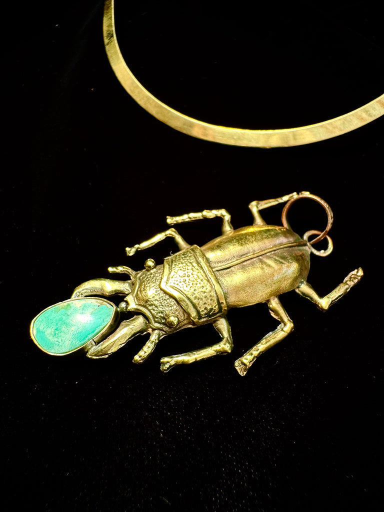 Stag Beetle Holding a turquoise stone Necklace