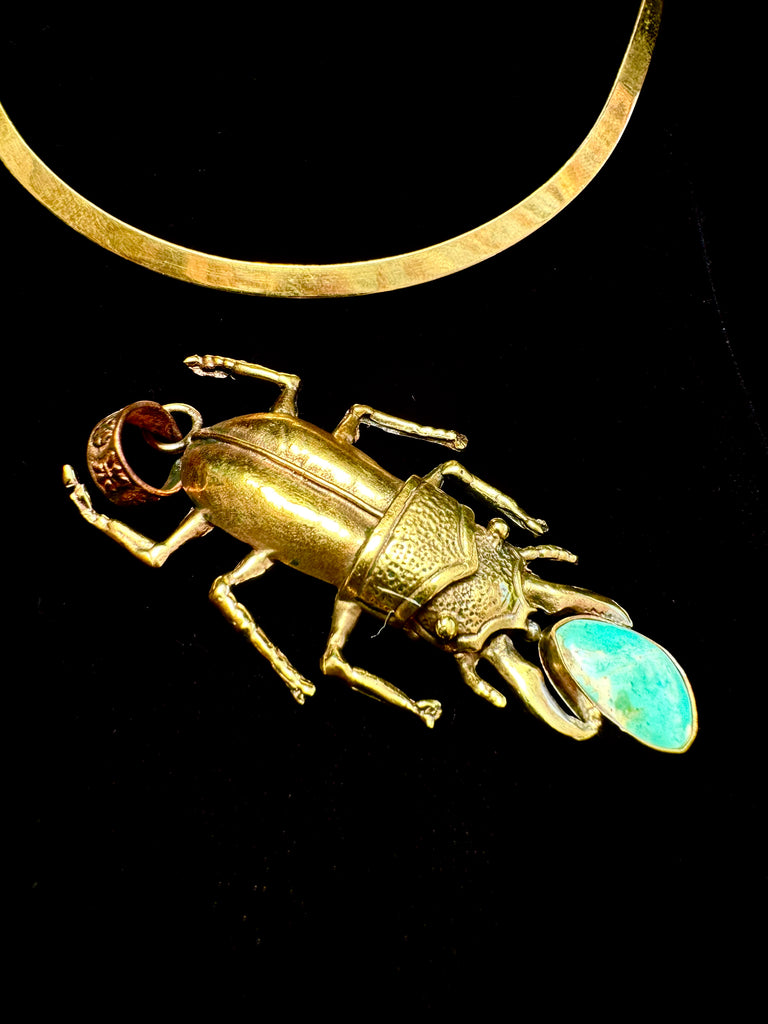 Stag Beetle Holding a turquoise stone Necklace
