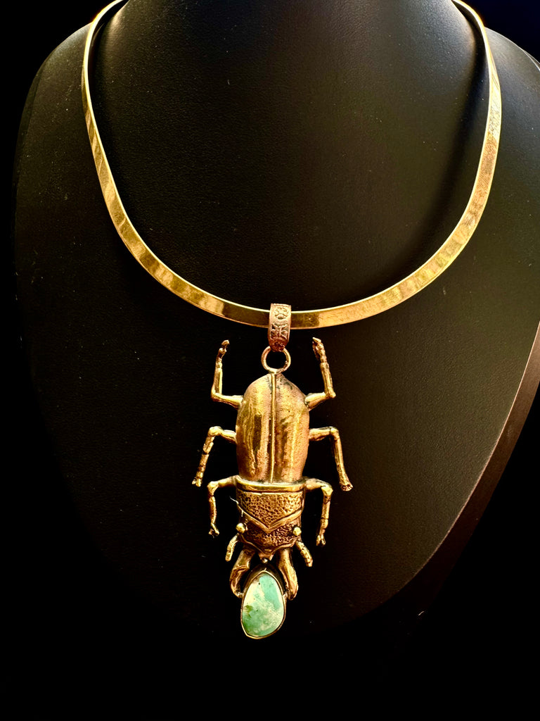 Stag Beetle Holding a turquoise stone Necklace